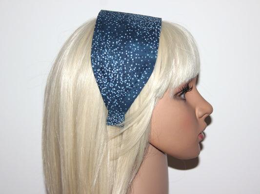 Blue glittery headband on a blue background